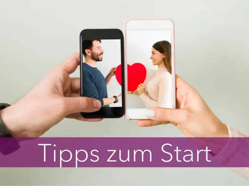 Online Dating. Zwei Smartphones nebeneinander mit einem Herzsymbol auf dem Display.